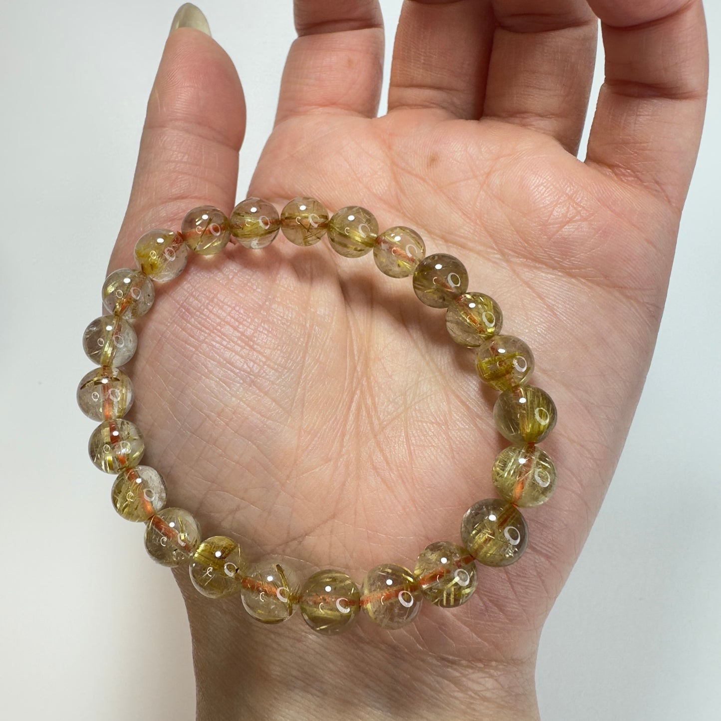 “Celestial Wires” Premium Titanium Rutilated Quartz Bracelet
「星耀金絲」頂級鈦金髮晶手串 – 8mm（Brazil 巴西）
