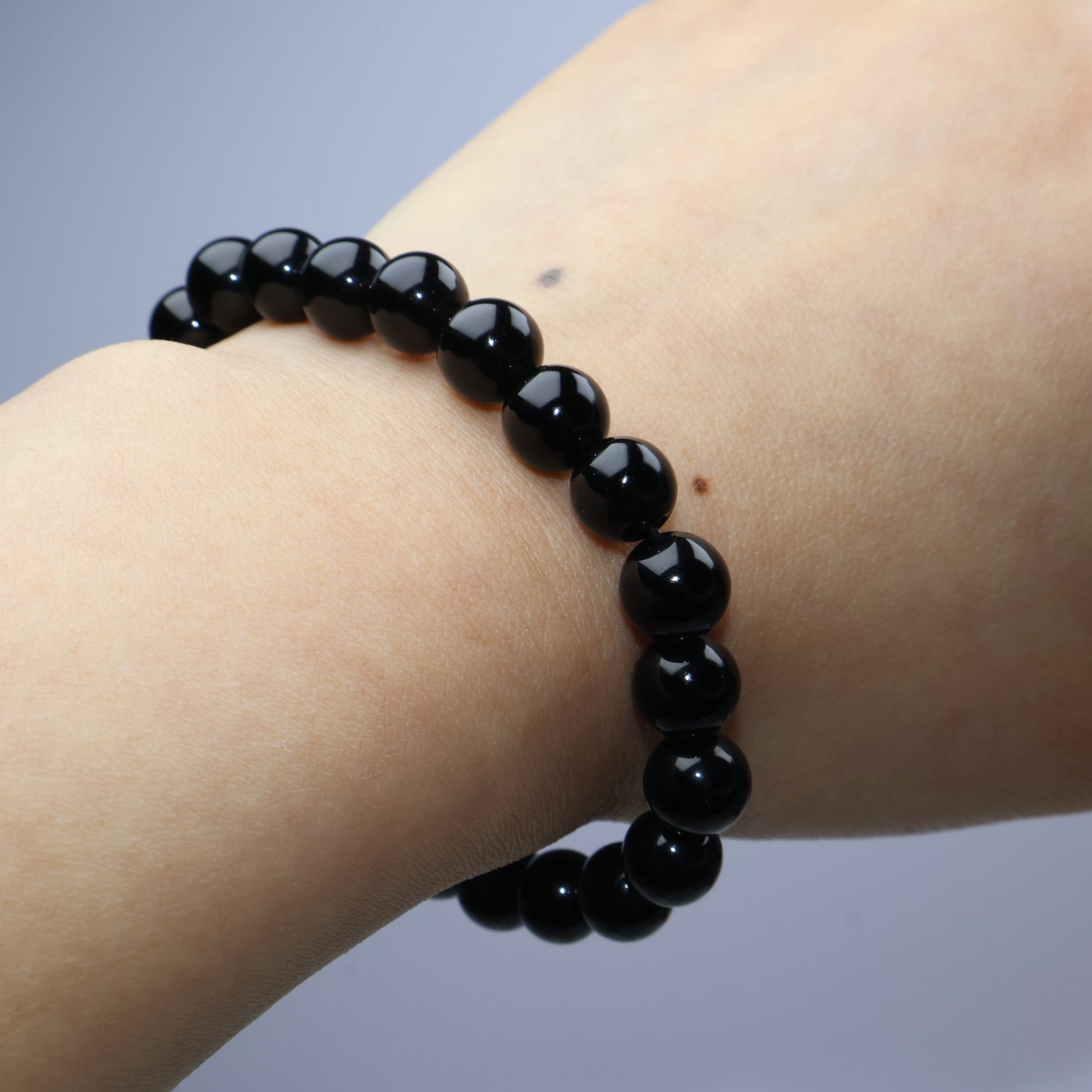 Wrist shot with bracelet worn naturally to show fit and simplicity