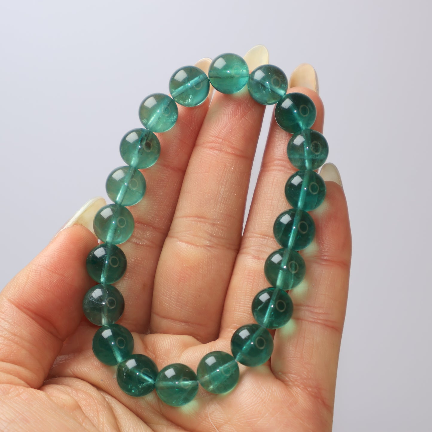 Natural 9mm Green Fluorite Bracelet in Hand 