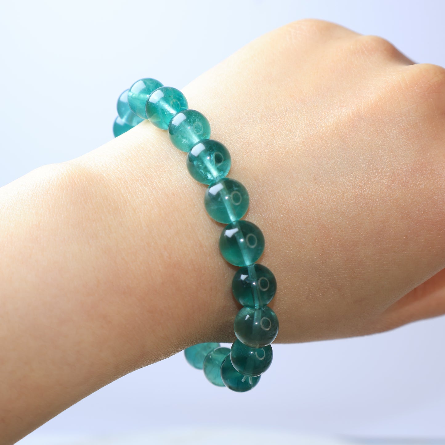 Natural 9mm Green Fluorite Bracelet on Wrist – Front View