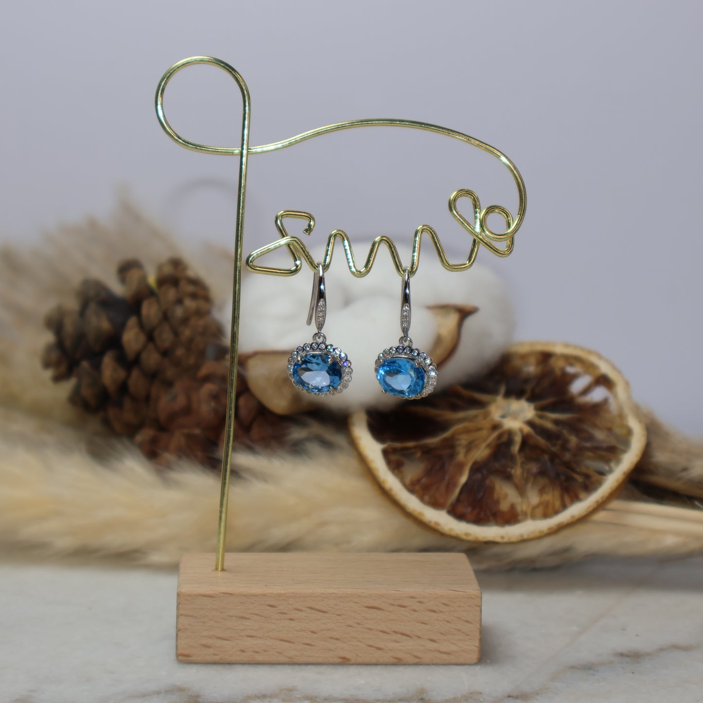 7×9mm Natural Blue Topaz Earrings in S925 Sterling Silver Display