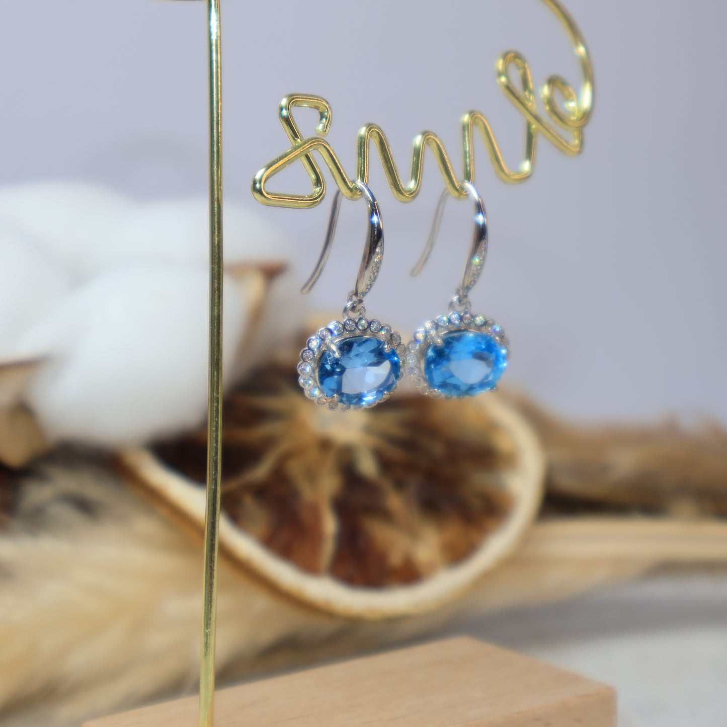 Close-up of 7×9mm Blue Topaz S925 Sterling Silver Earrings