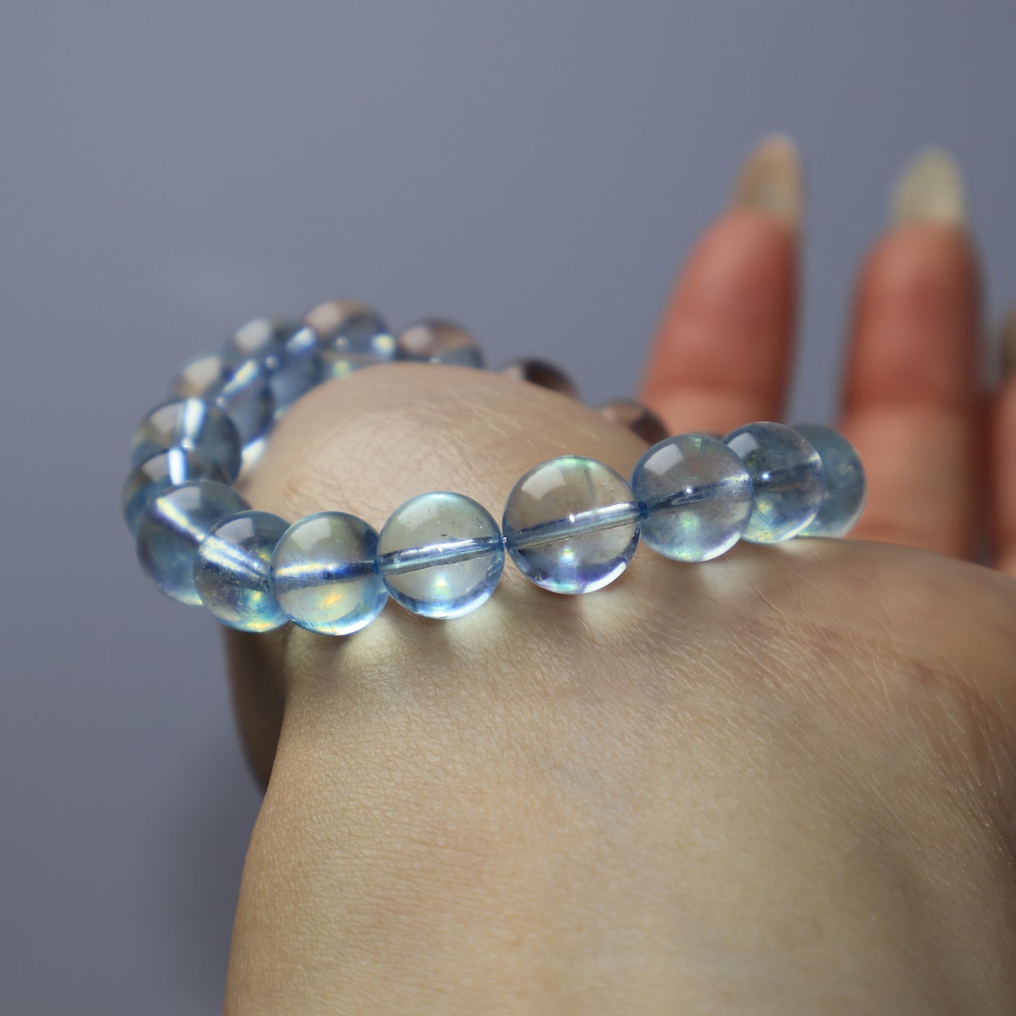 Close-up of natural Aquamarine bracelet with translucent blue beads