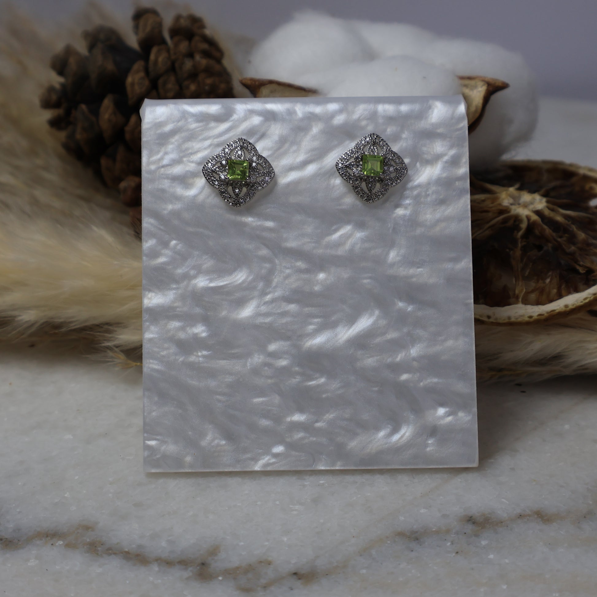 Square peridot stud earrings with sparkling cubic zirconia