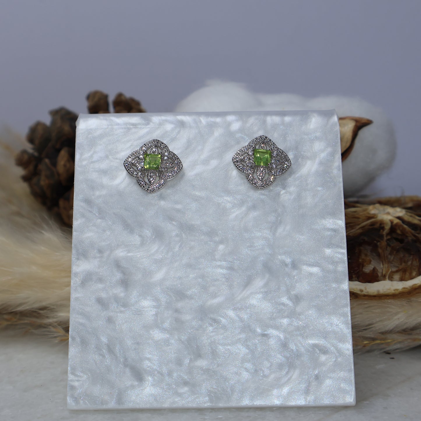 Genuine peridot sterling silver earrings front display