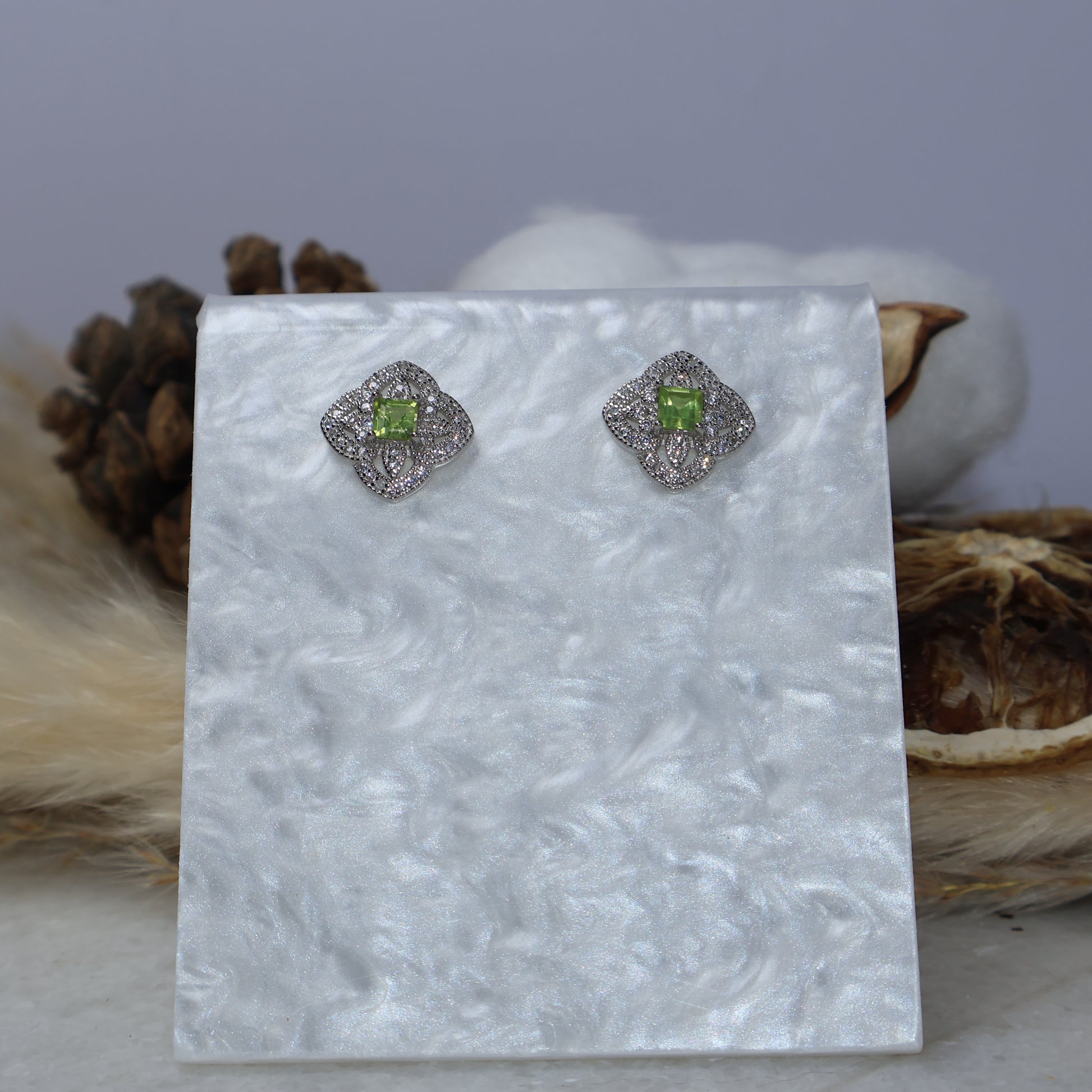 Genuine peridot sterling silver earrings front display