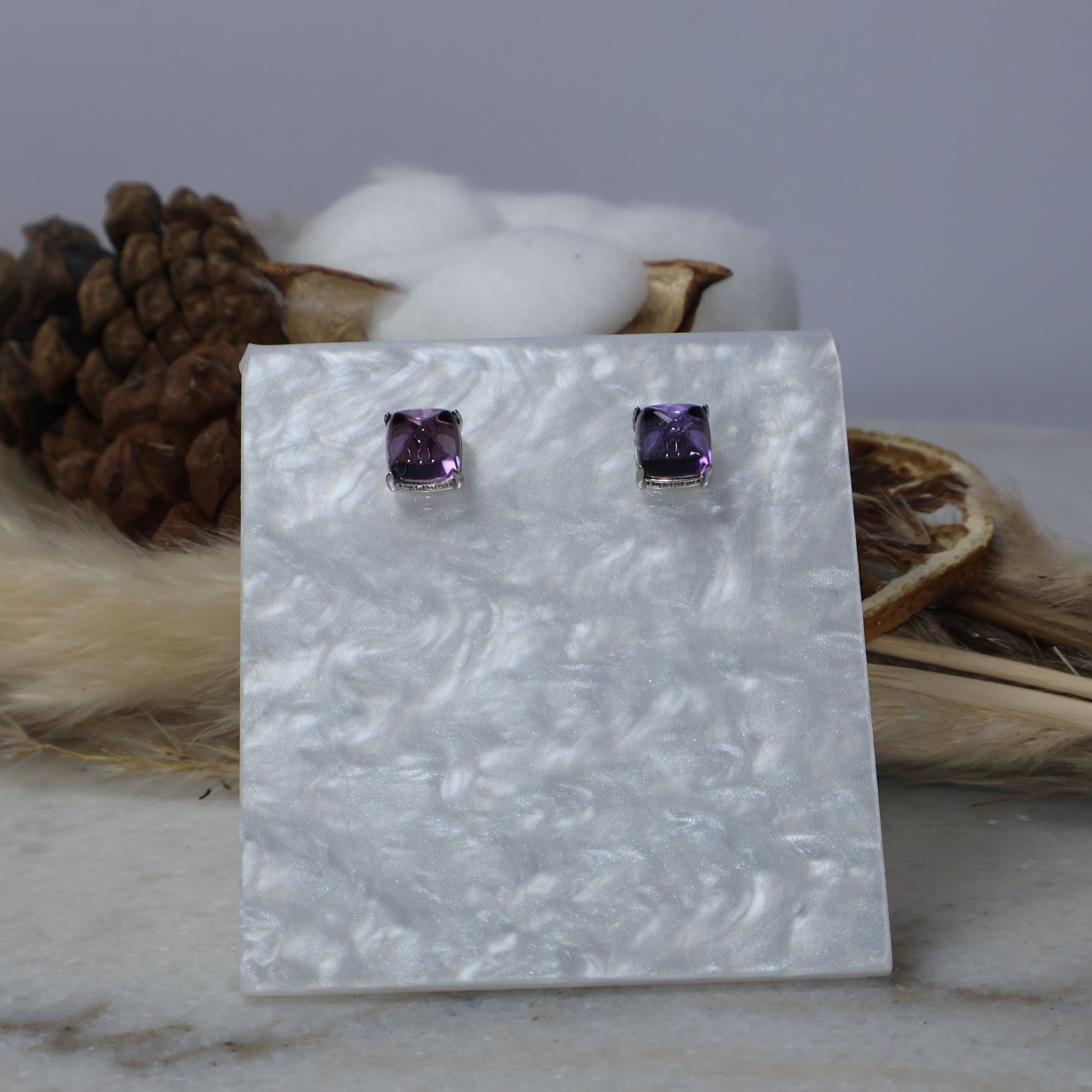 S925 sterling silver natural amethyst stud earrings on display