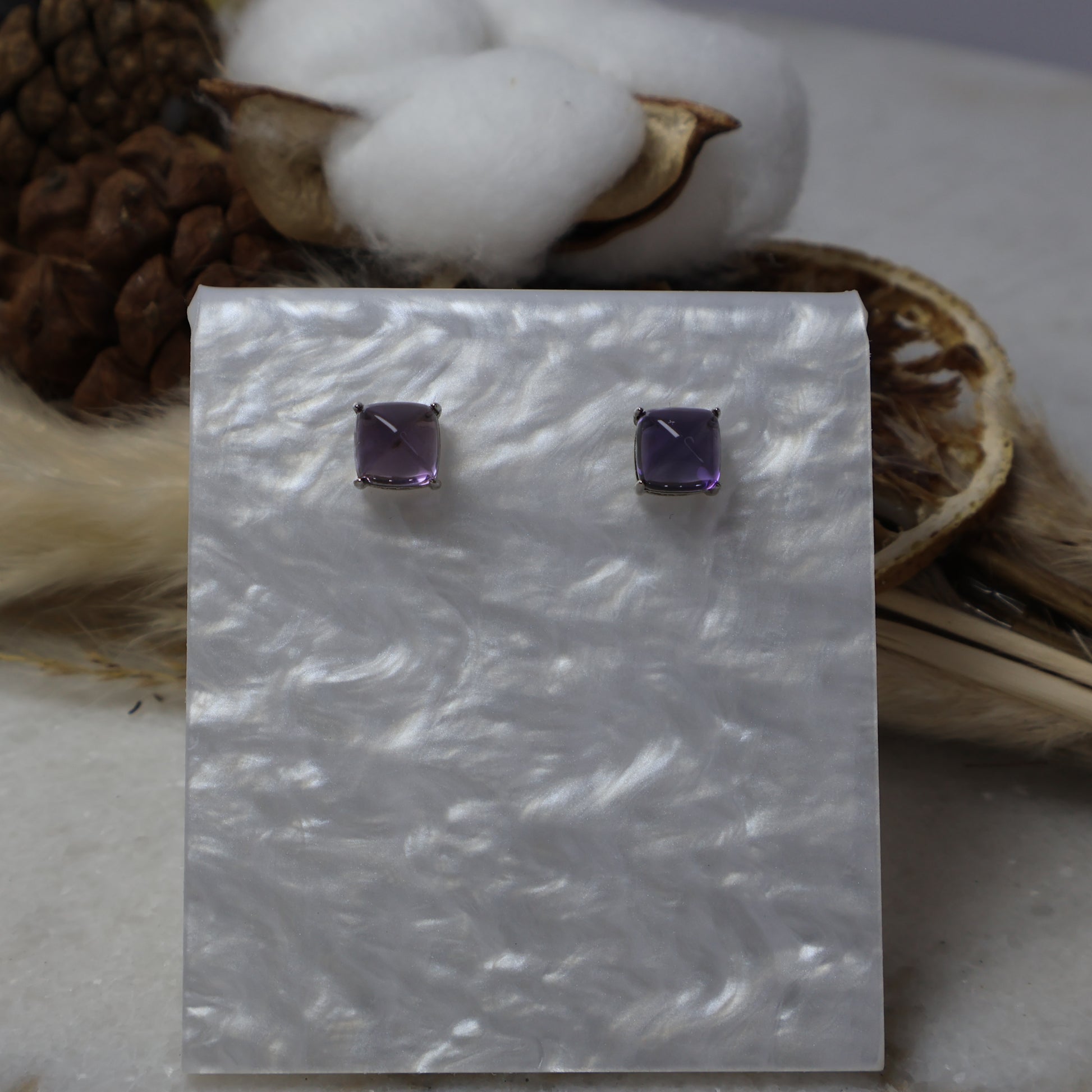 Genuine 7mm amethyst sterling silver stud earrings front view