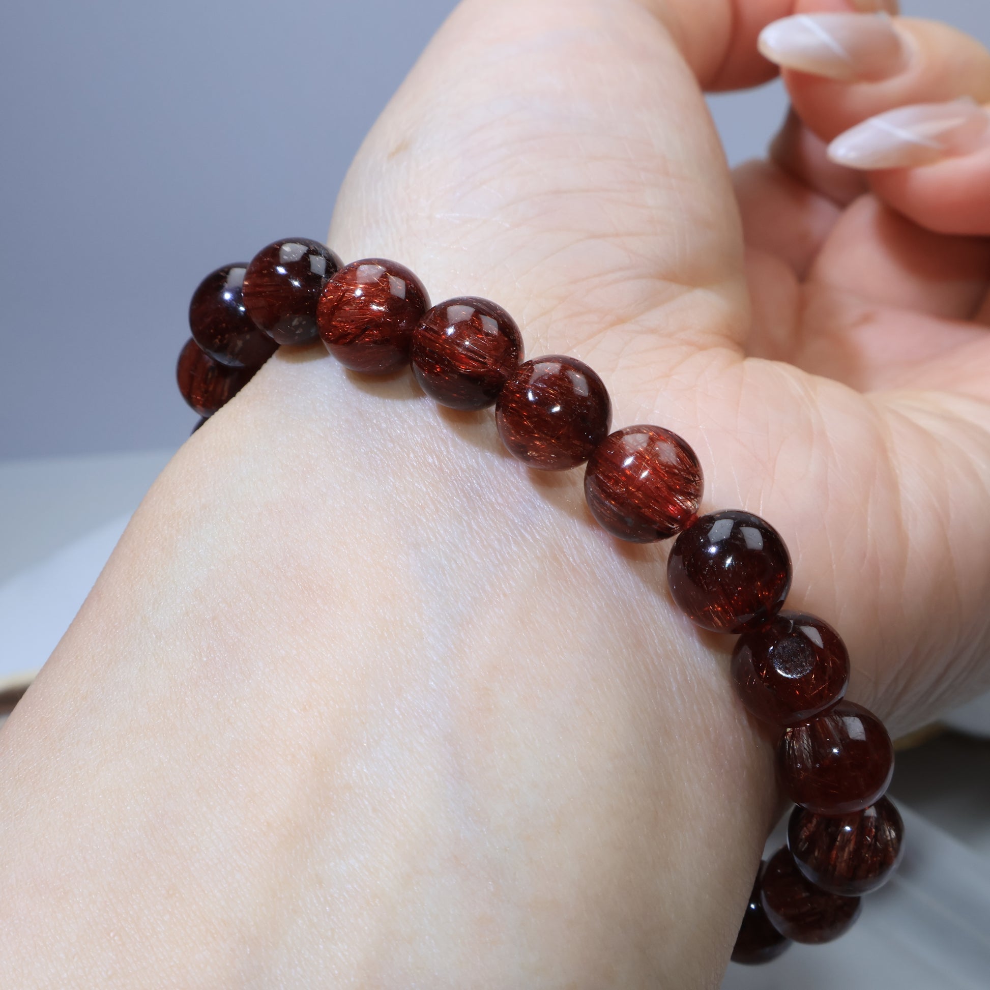 angled wrist view emphasizing neat strands and rich color
