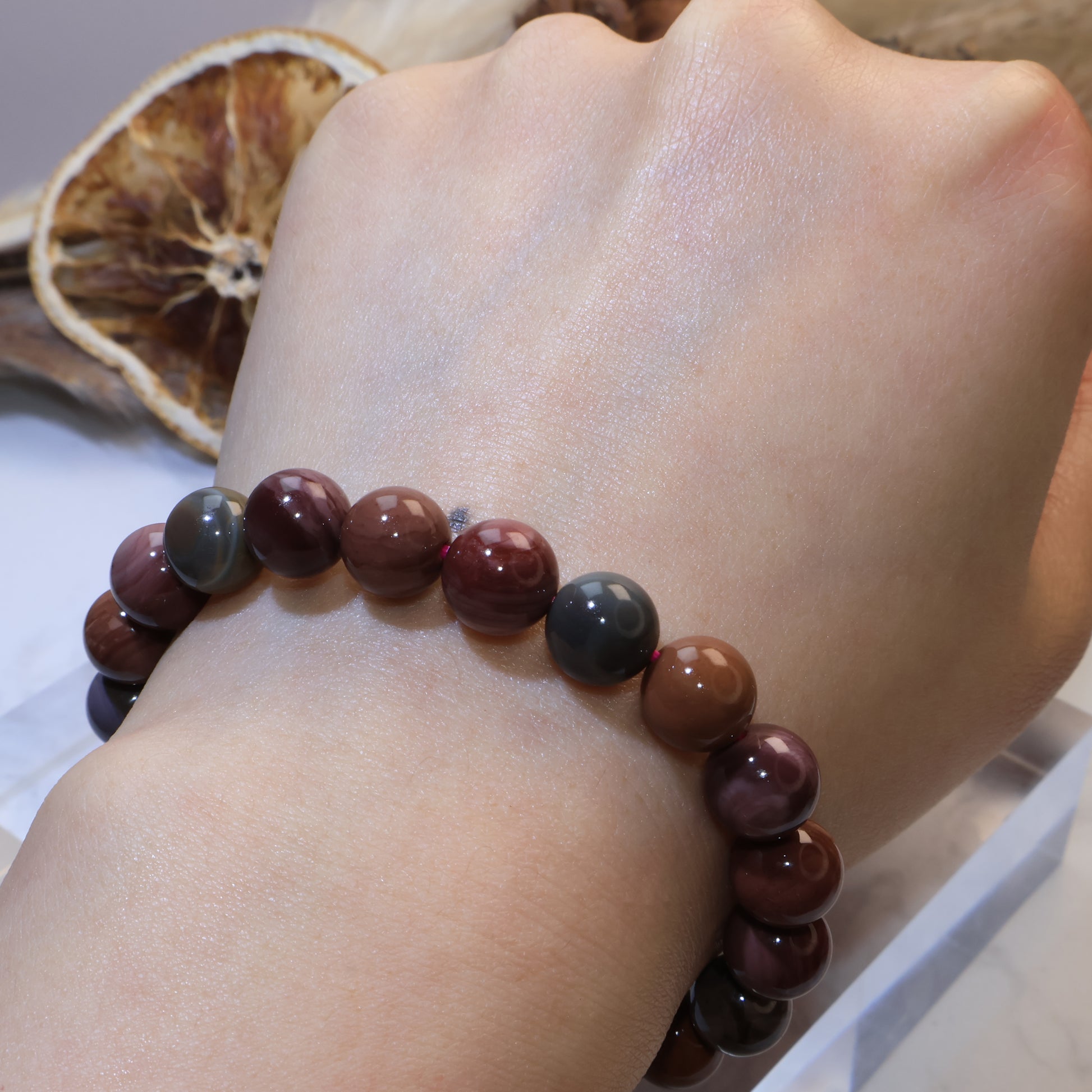Wrist shot showing full bracelet view with natural colors