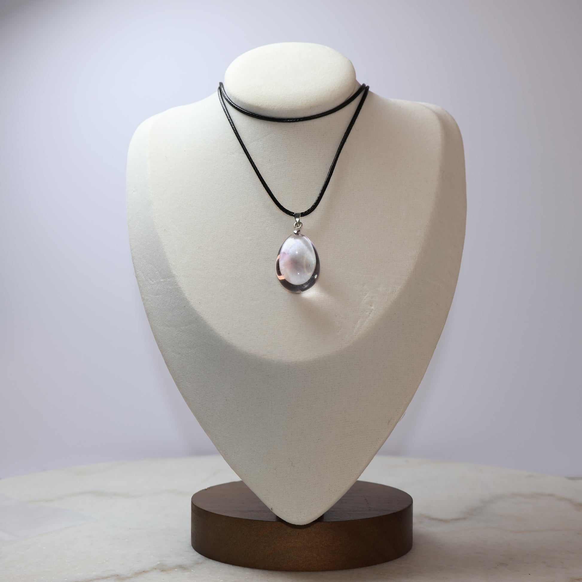     Natural Amethyst teardrop pendant on necklace display