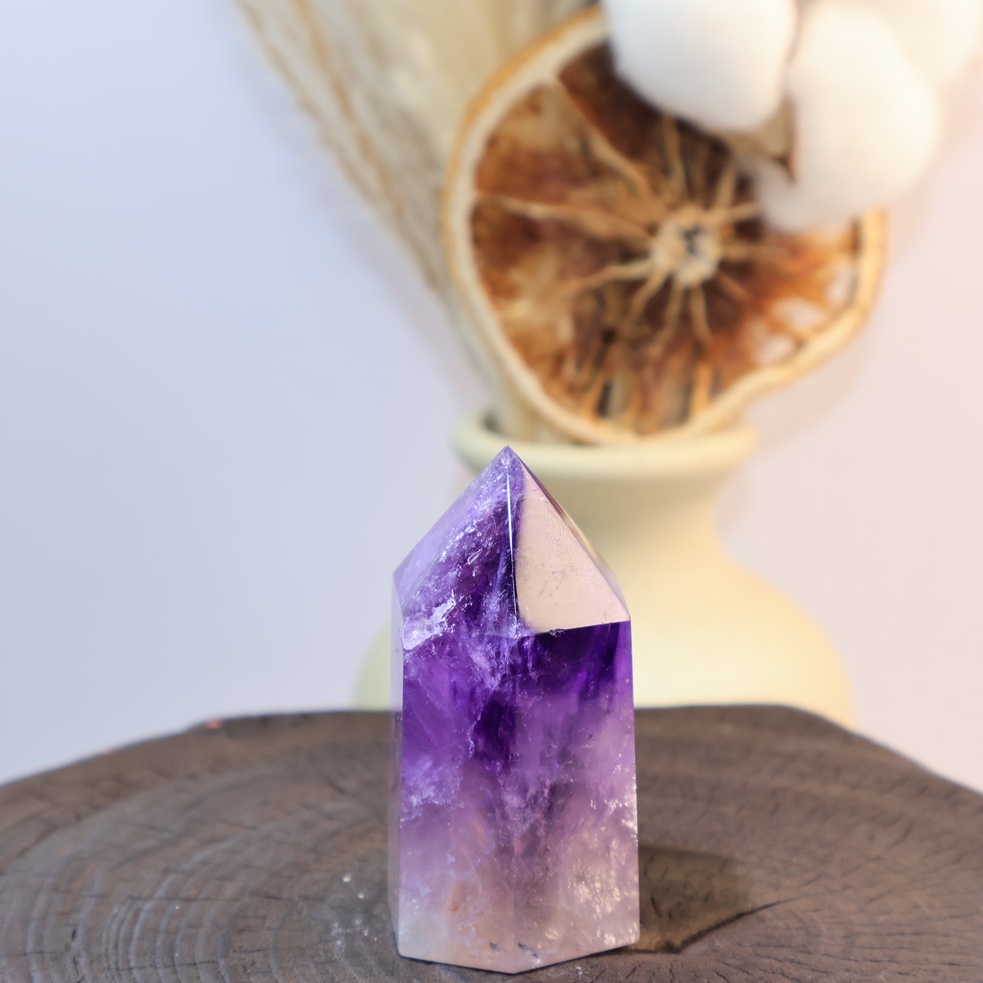 Amethyst tower angled view, highlighting natural textures.