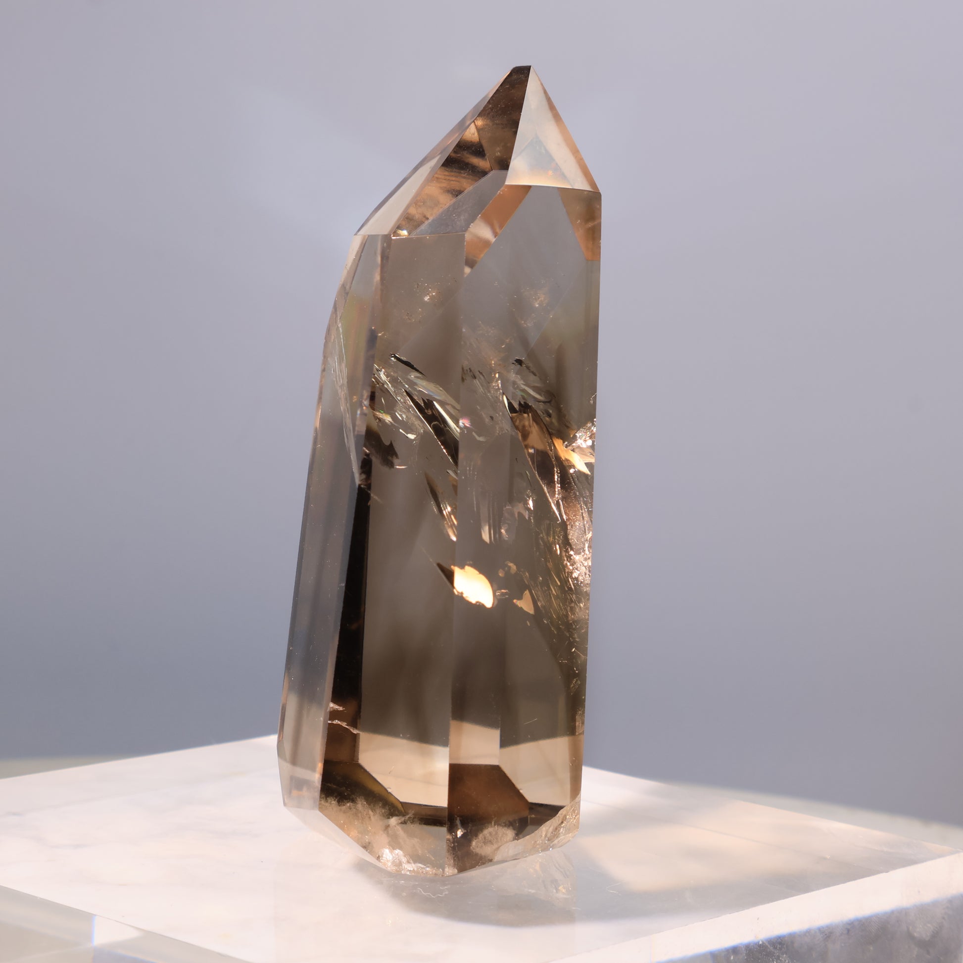 Smoky Quartz Tower – standing upright with golden-brown tones.