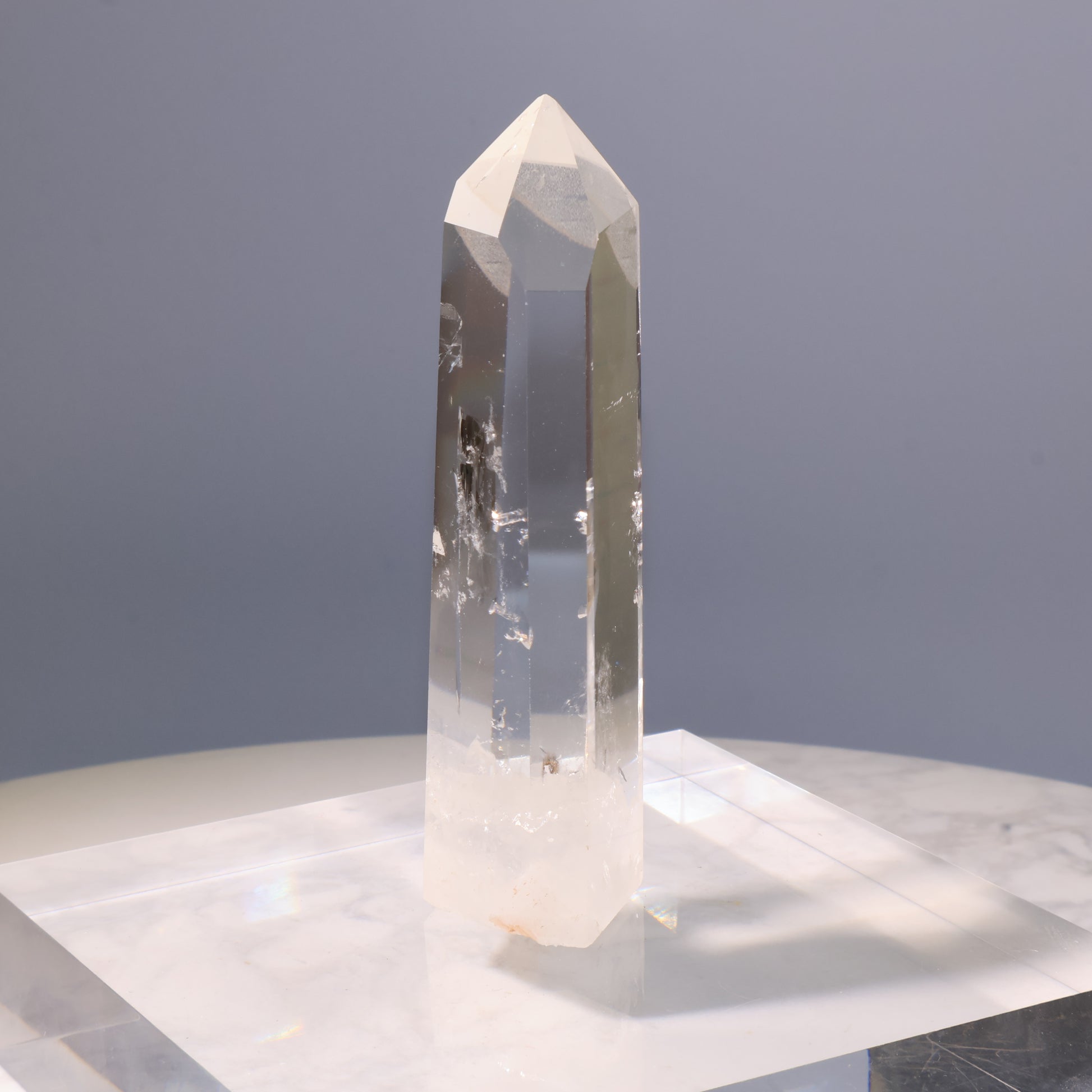 Clear Quartz Tower – side view showing natural internal fractures.