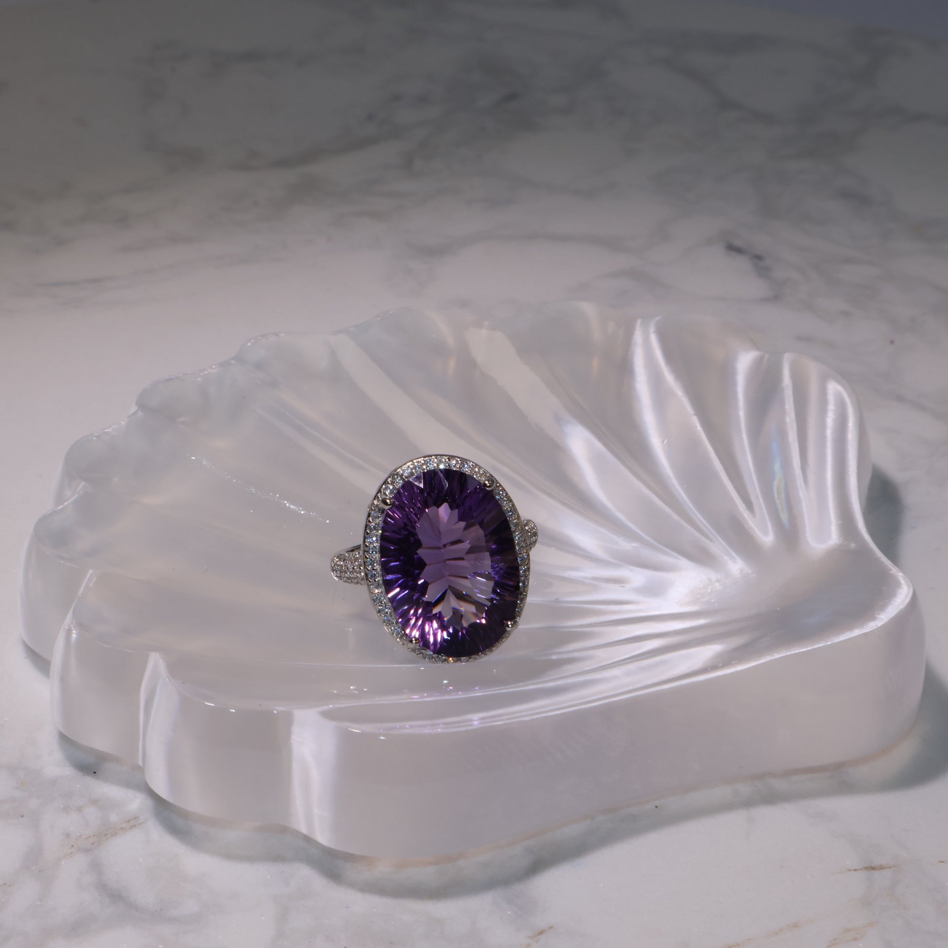 Frontal view of the Amethyst ring highlighting the 12.6×17.9mm faceted gemstone.