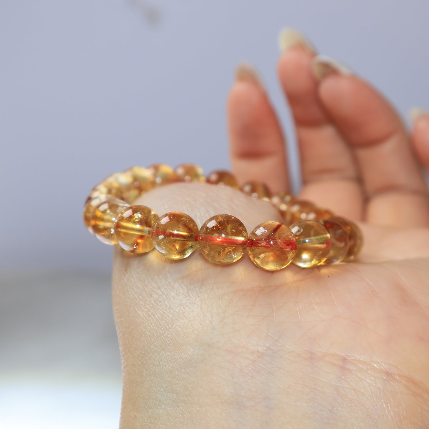 Close-up of natural Citrine crystal beads with internal textures