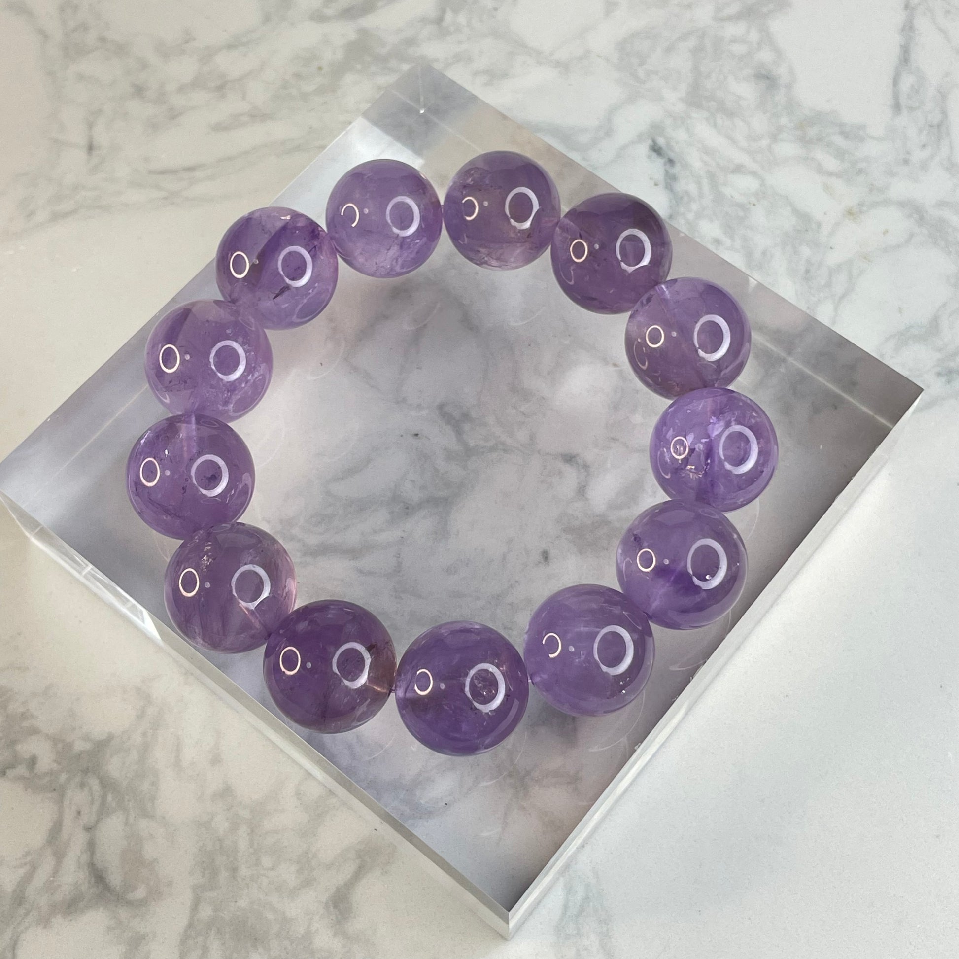 Deep purple amethyst crystal bracelet 17mm – glossy beads from Brazil for spiritual healing.