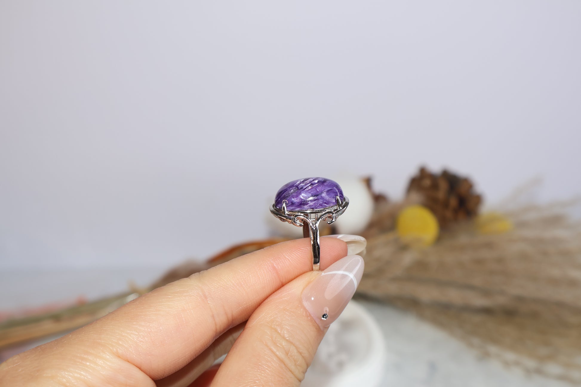 Side view of charoite crystal ring in S925 silver shown on hand